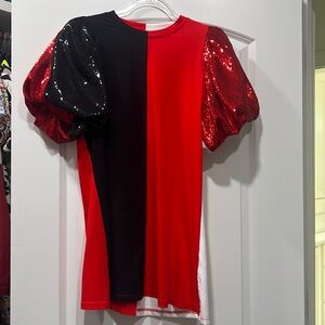 Queen of sparkles size small red, black, white dress with sequin puff sleeve.